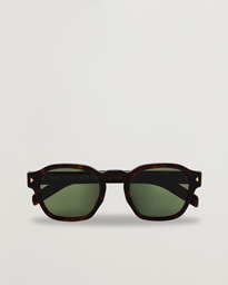 Prada 0PR A16S Sunglasses Radica Tortoise